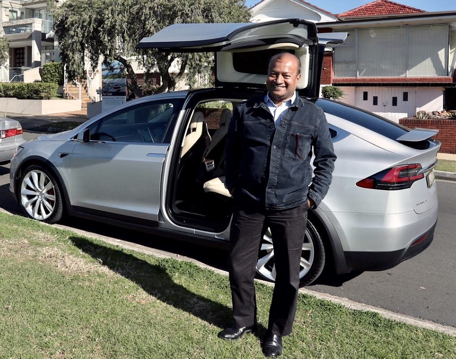Sohail Hasnie test-driving a Tesla Model X, Australia 2018
